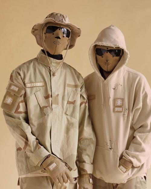 Two persons dressed with KL company's jackets